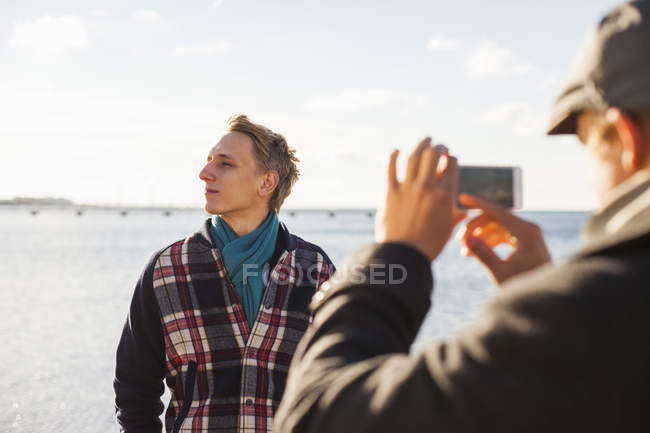 Man photographing gay partner — Stock Photo