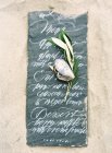 Tablet with dinner menu on sand — Stock Photo