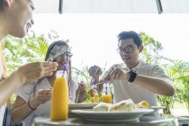 A Group Of Friends Are Enjoying Their Meal. — Stock Photo