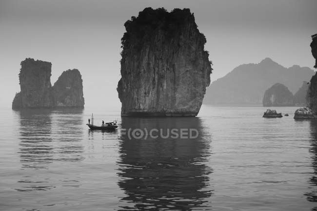 Fishermen in boat in lake — Stock Photo