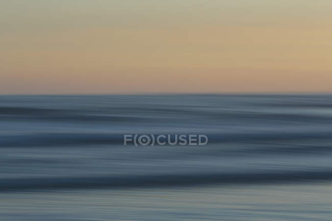 Spiaggia sopra l'oceano al tramonto — Foto stock