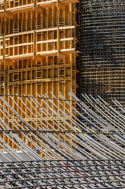 Construction form and rebar with skyscraper in evening sunlight, Spokane, Washington, USA — Stock Photo