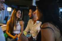 People drinking in bar — Stock Photo