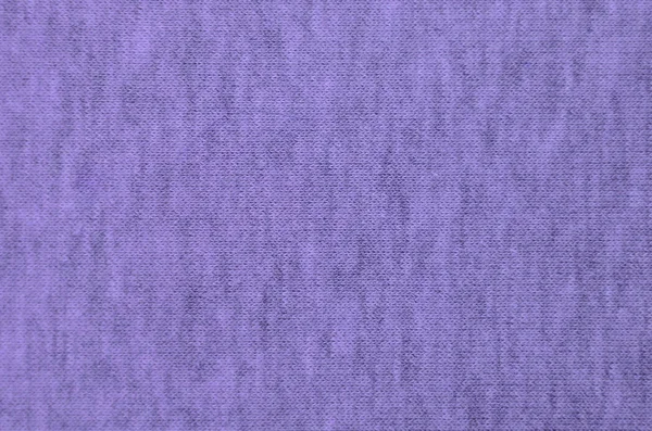 Real heather knitted fabric made of synthetic fibres textured background. Colored fabric texture. Background with delicate striped pattern.