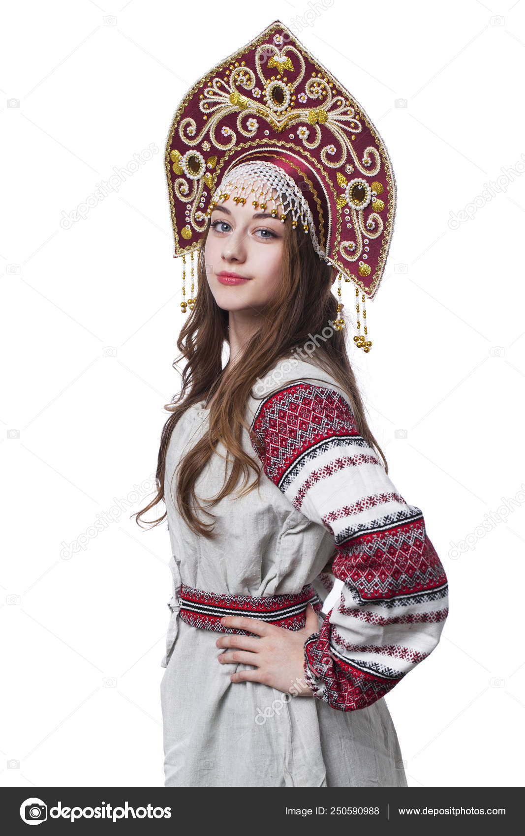 Traditional Russian folk costume, portrait of a young beautiful Stock Photo  by ©arkusha 250590988