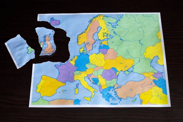 A torn paper map symbolizing the UK leaving the European Union or Brexit