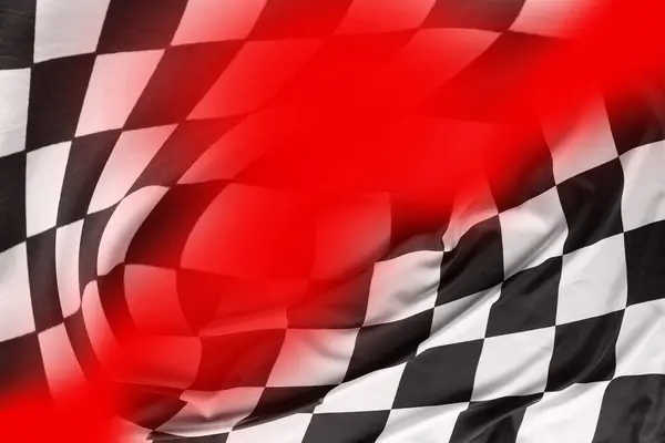 Checkered black and white flag on red background