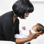 Mother looking at newborn