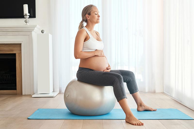 hip circles birthing ball