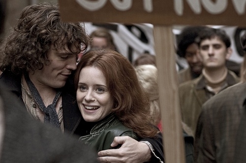 Jack (Sam Claflin) puts his arm round Charlotte (Claire Foy) at a demonstration