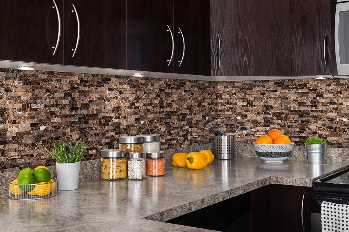 Split-face stone veneer installed for kitchen backsplash