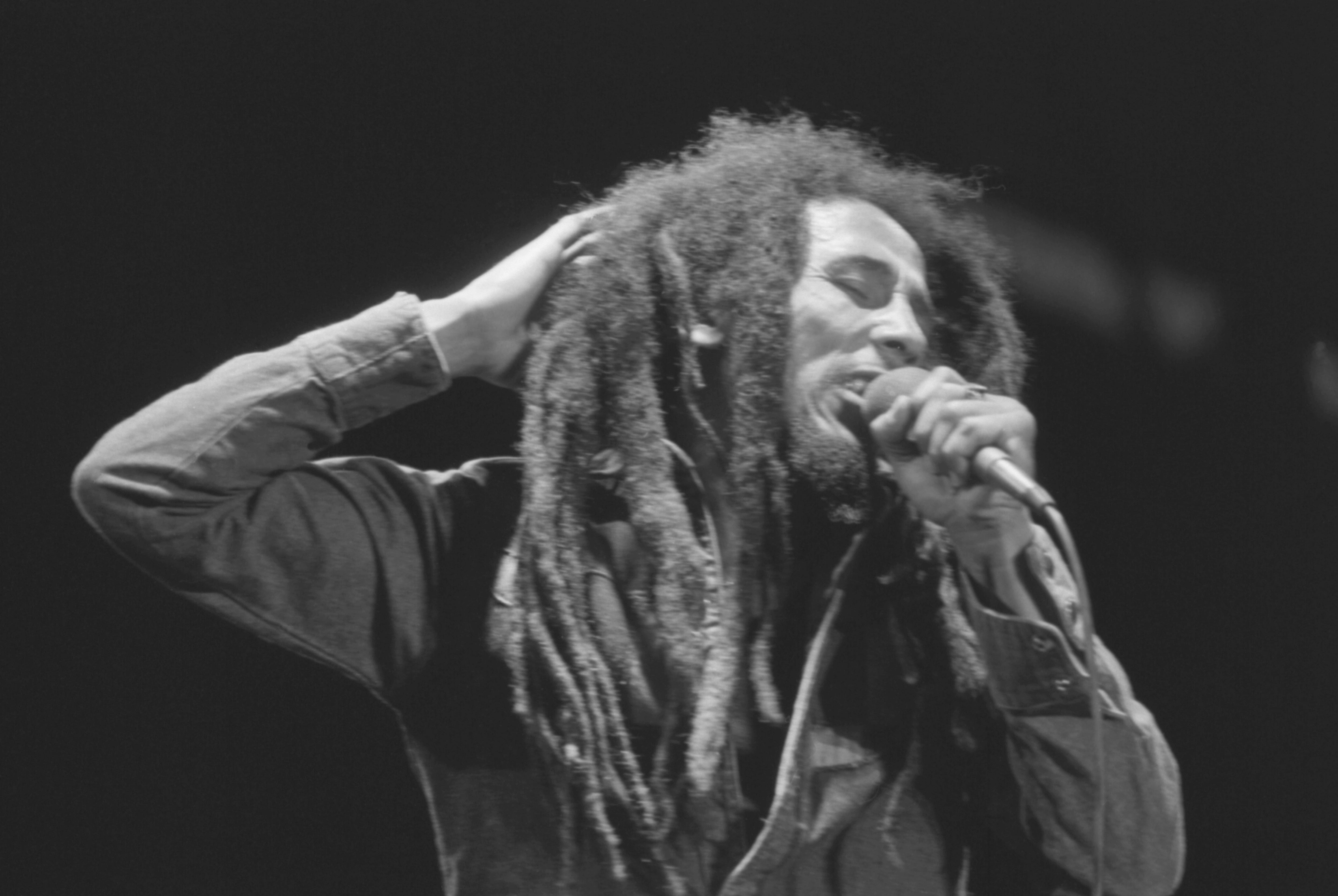 Bob Marley performs in front of an audience of 40,000 during a festival concert of Reggae in Paris, France, 1980