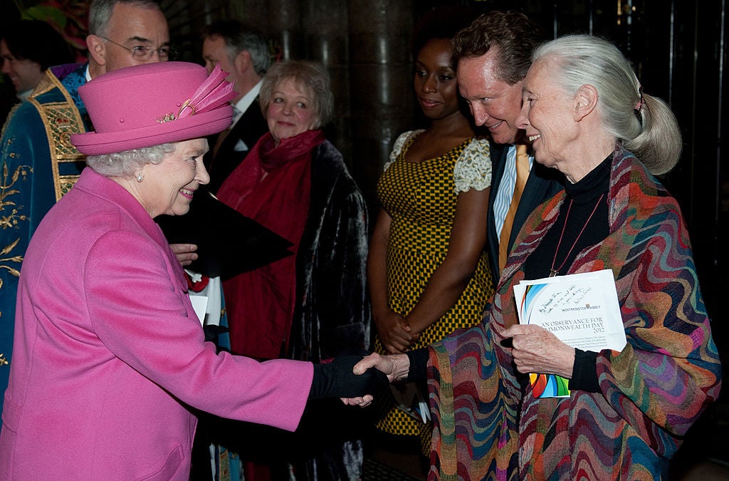 The late Queen shakes hands with conservationist Dr Jane Goodall DBE following the annual Commonwealth Day Observance Service on March 12, 2012 in London