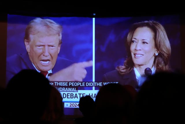 <p>Slight of hand? Donald Trump points at US presidential debate rival Kamala Harris </p>