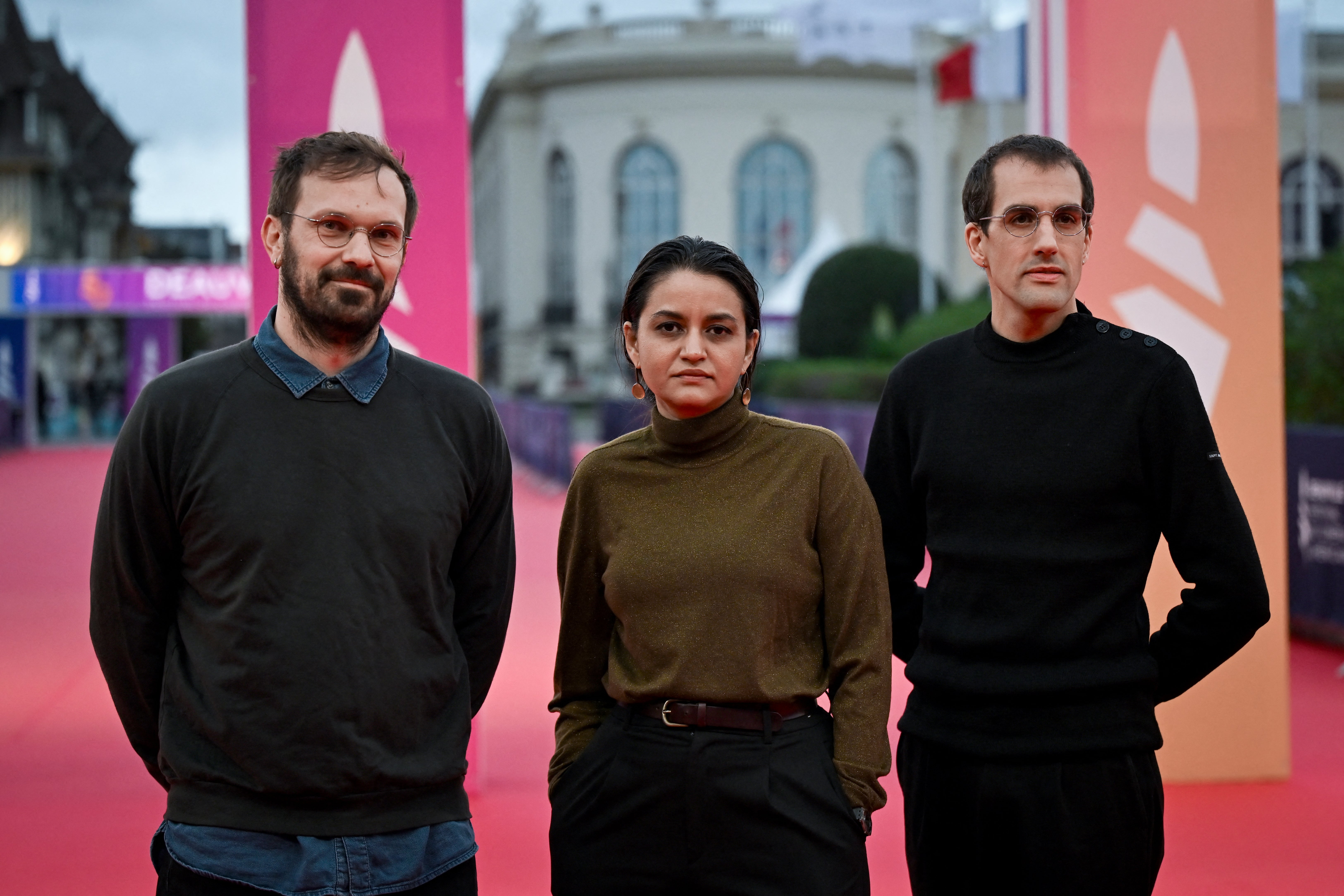 French producer Thomas Hakim, Indian director Payal Kapadia and French producer Julien Graff at the presentation of All We Imagine as Light at The Deauville American Film Festival