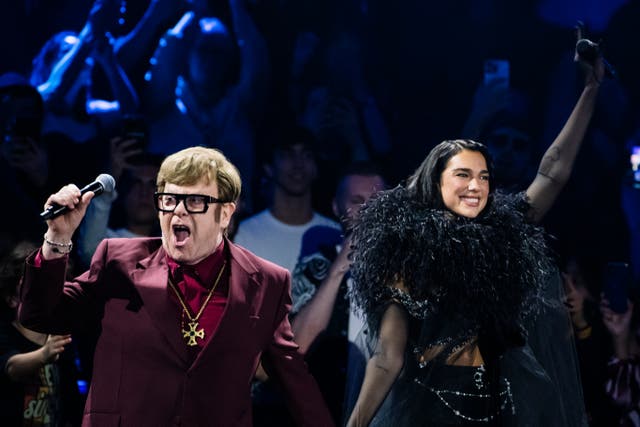 <p>Elton John joins Dua Lipa on stage at the Royal Albert Hall</p>