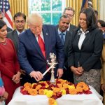 Donald Trump lights a diya on Deepavali in the Oval Office, October 24, 2019