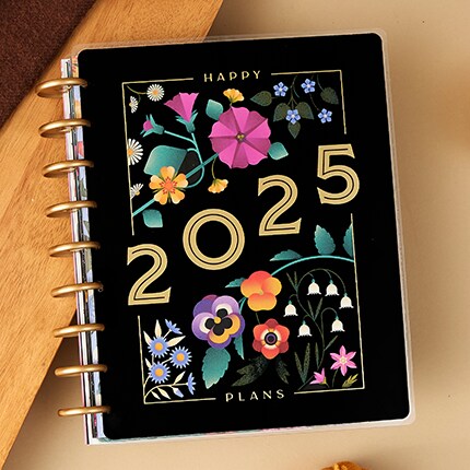 2025 planner with black and floral cover 