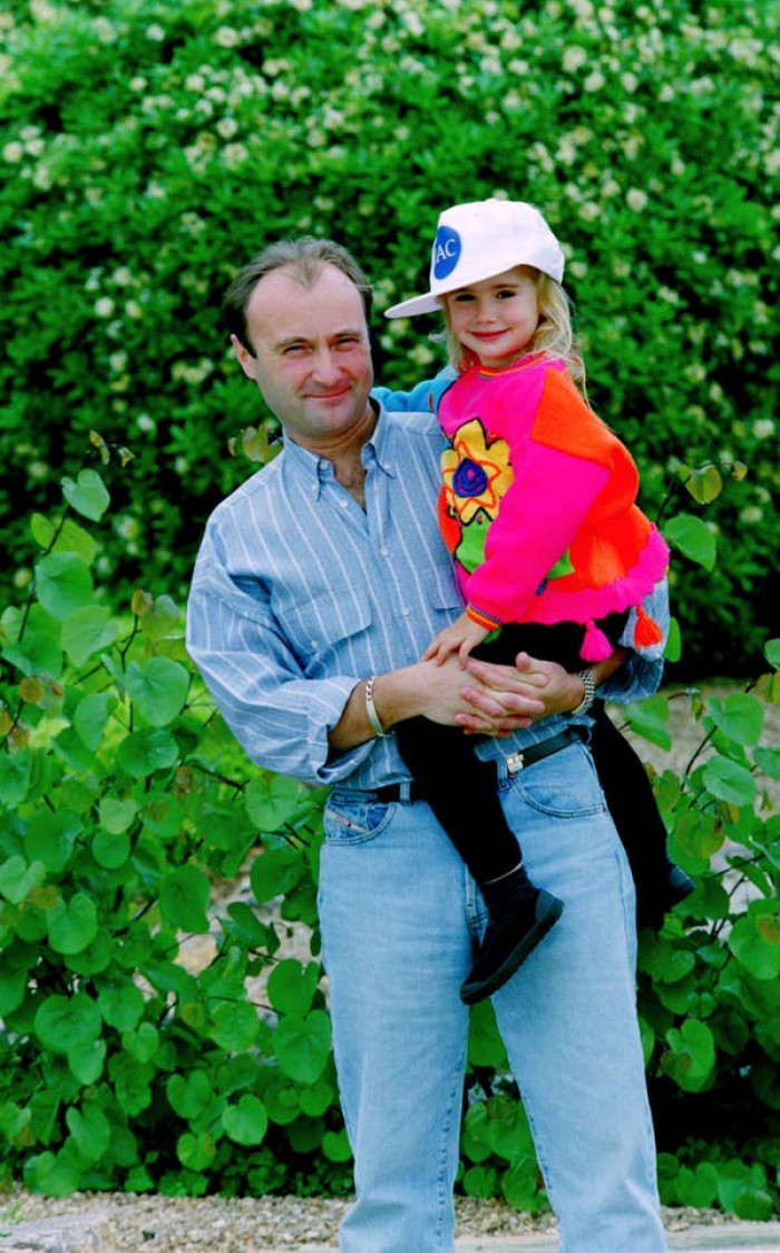 12. Lily Collins with her dad, Phil Collins