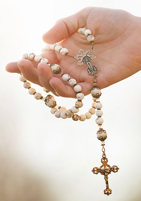 Rosary in hand