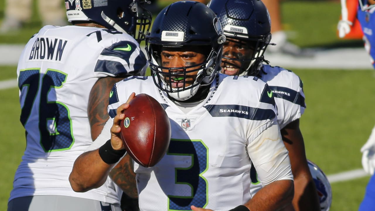 Seattle Seahawks quarterback Russell Wilson turns a rare quarterback