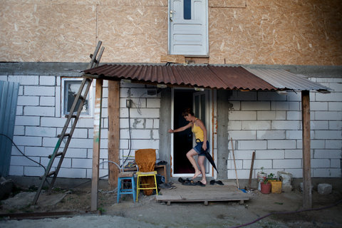 With their combined wages, earned during the asparagus season in Germany, Petruta and her son are trying to finish building their house.