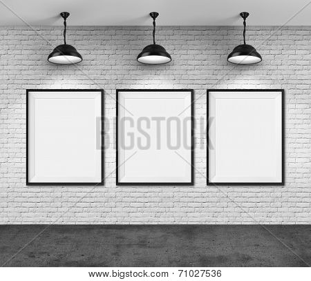 Art gallery. Blank picture frames on brick wall background.