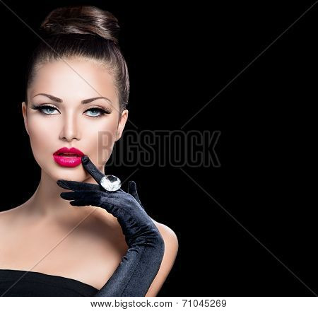 Beauty Fashion Glamour Girl Portrait over black background. Vintage Style Girl Wearing Gloves. Jewellery. Jewelry. Glamor Hairstyle and Make-up. Sexy Red Lips. Diamond Ring. Retro Woman Portrait 