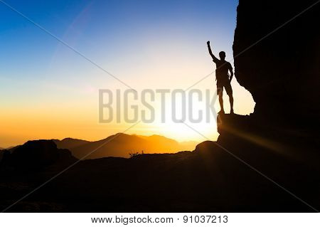 Man Hiking Climbing Silhouette Success In Mountains Sunset