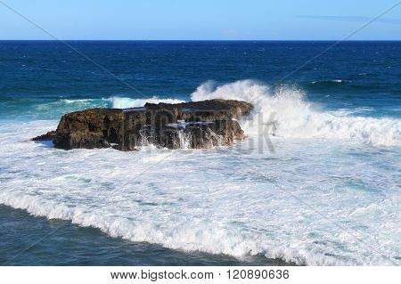 Amazing view to Gris-Gris sea cliffs on Mauritius Island where the constant squashing of waves against the flanks of the cliff gives the impression that the cliff is crying.