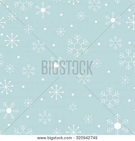 Seamless Pattern Cold Winter In Christmas Day With Cute Cartoon Snowflakes In Different Size On Blue