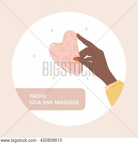 Gua Sha Scraper For Facial Massage. African Female Hand Holding Natural Pink Quartz Stone. Trendy Be