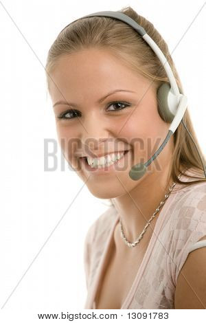 Happy young customer service girl in headset smiling.