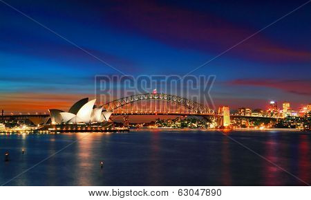 Sydney Opera House And Harbour Bridge At Sundown