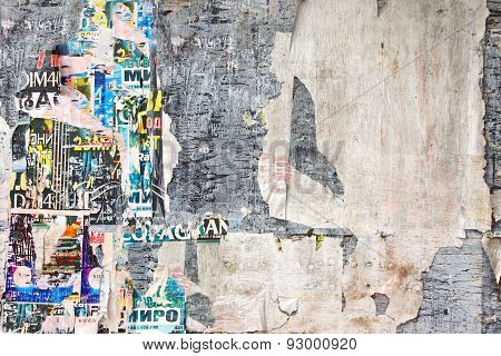 Old Weathered Wood Billboard With Torn Posters