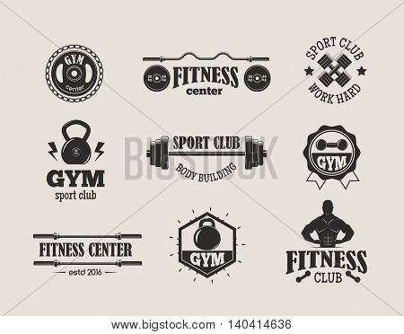 Set of monochrome gym fitness emblems, labels, badges, logos and designed elements. Gym fitness logo muscle body weight bodybuilding. Strong people club vector gym fitness logo set.