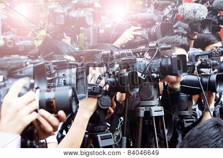 Press And Media Camera ,video Photographer On Duty In Public News Event For Reporter