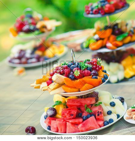 Beautifully Decorated Catering Banquet Table With Different Food Snacks And Appetizers On Corporate