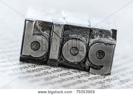 the word blog written with lead letters. symbol photo for blog