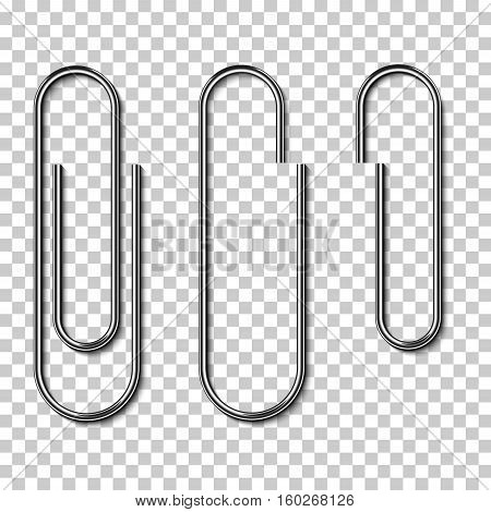 Metal paperclips isolated and attached to paper