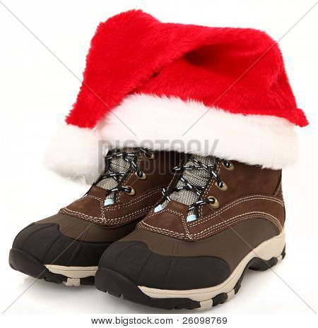 Woman's tie up (lace up) weather proof snow boots with santa hat.