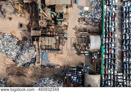 An Aerial View Directly Above A Scrapyard Or Junkyard Recycling And Wrecking Damaged And Write Off C