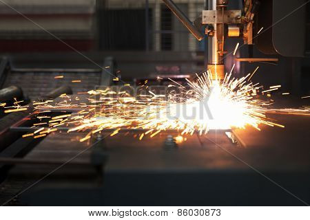 Industrial cnc plasma cutting of metal plate