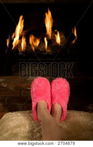 Warming Feet By The Fire