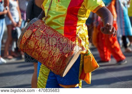 Percussionist Playing With A Dhol During The Carnival Of The Grand Boucan.