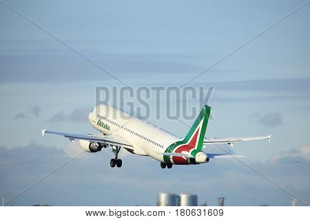 Amsterdam the Netherlands - April 7th 2017: EI-DSL Alitalia Airbus A320 takeoff from Polderbaan runway Amsterdam Airport Schiphol