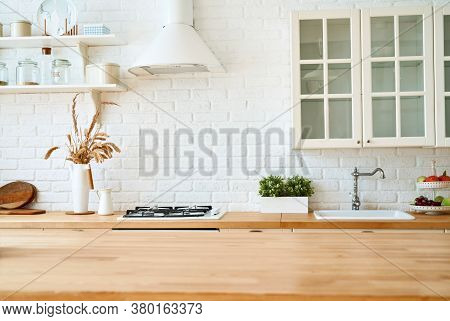 Kitchen Wooden Table Top And Kitchen Blur Background Interior Style Scandinavian