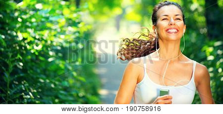 Running sporty woman. Female Runner Jogging during Outdoor Workout in a morning Park. Beautiful fit Girl. Fitness model outdoors. Weight Loss. Healthy lifestyle. Jogging healthy female. Wide banner