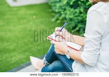 Student Writing At Park, Working Outdoor Women Work Business Job Writer Write Text In Notebook.