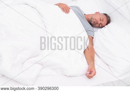 Healthy Habits. Man Handsome Guy Lay In Bed Sleeping. Get Enough Amount Of Sleep. Tips Sleeping Bett